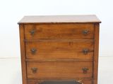 an old wooden chest of drawers with three drawers on each side