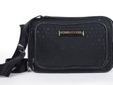 a close up of a black bag with a black strap