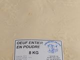 a picture of a sign on the sand of a beach