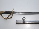 an image of a sword and a hook on a white surface