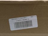 an open box with a barcode on it sitting on top of a table