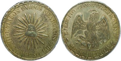 a close up of a coin with a bird on it