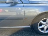 a car that is parked on the side of the road