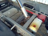 a close up of a vehicle with a fuel tank attached to it