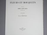 a close up of a white book with black writing on it