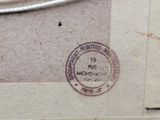a stamp on a piece of paper that has a rope on it