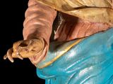 a statue of a woman holding a baby in her arms