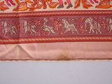 a picture of a pink and orange scarf with elephants on it