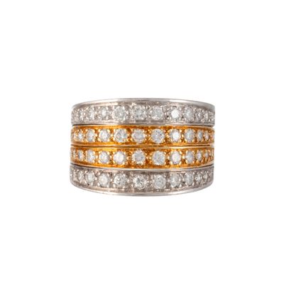 a close up of a ring with two rows of diamonds
