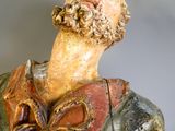 a statue of a man with a beard and a beard