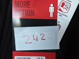 a tag that says live more action next to a picture of a person