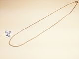 an image of a necklace with a chain attached to it
