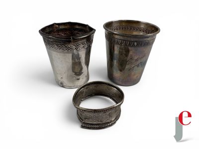 two silver cups with a silver band and a silver ring