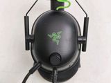 a close up of a gaming headset with a mouse on top of it