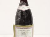 a bottle of wine that is sitting on a table
