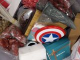 a pile of assorted items that are on a table