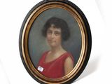 portrait of a woman in a red dress in a gold frame