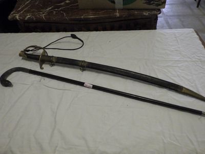 two old canes sitting on a table in a room