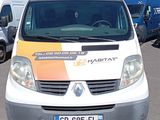 a white van that is parked in a parking lot