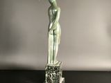 art deco sculpture of a female figure on a marble base