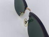 a pair of sunglasses on a white surface