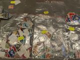 a lot of stamps on the floor with stickers all over it