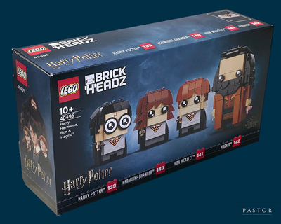 trois figurines Lego représentant Harry Potter et Hermione dans une boîte