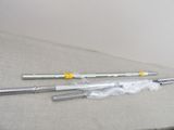 two tools that are laying on a table