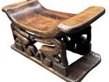 an old wooden bench with carvings on it on a white background