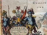 an old map of france with a man and a woman on it