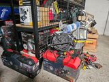 a lot of tools that are sitting on a shelf