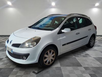 a picture of a white car parked in a garage
