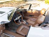 an image of a white and brown car with leather seats