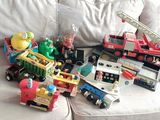 a lot of toys that are on the couch