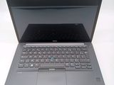 a laptop computer with a keyboard on the top of it