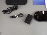 a nintendo wii game system and accessories on a table