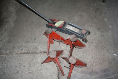 four tools that are laying on the ground