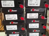 several boxes of u - power products are stacked on top of each other