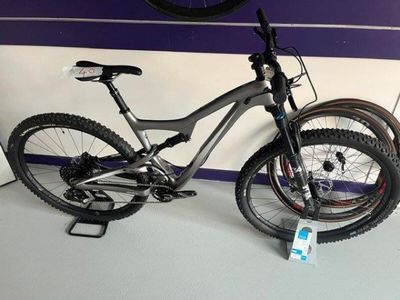 a bike that is sitting on the floor next to a wall