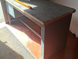 an image of a desk with a ruler on top of it