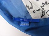 a close up of a blue and white bag with a blue label on it