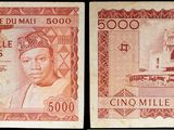 deux billets de banque différents, dont l'un porte l'effigie d'un homme