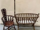 two chairs and a chair with a bird on it in a room