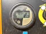 a close up of a clock on the side of a machine