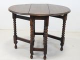 an image of a wooden table with a round table top