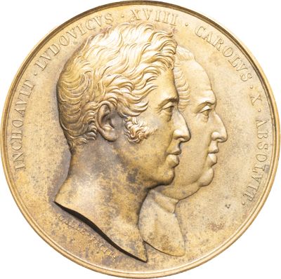 une image montrant un gros plan d'une médaille d'or à deux têtes