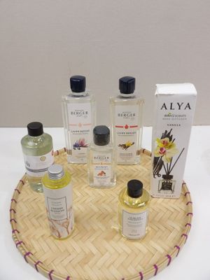 a tray with a lot of bottles of perfume on it