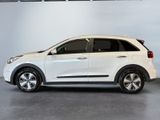 the white suv is parked in a garage with a white wall