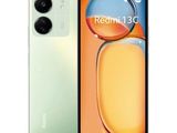 un gros plan d'un téléphone vert et blanc pris avec l'appareil photo d'un Redmi 3C