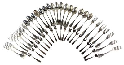 many forks and spoons arranged in the shape of a circle